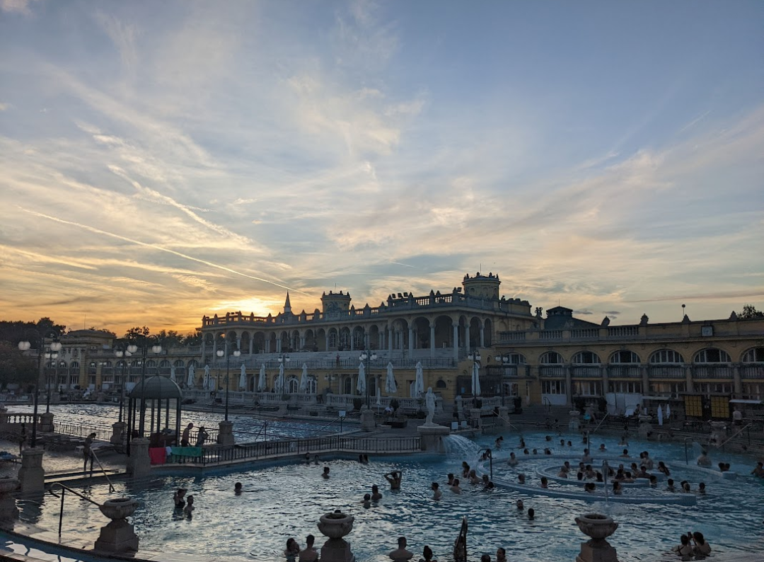 The Széchenyi thermal bath in Budapest, Hungary. It's water is supplied by two thermal springs and featured lots of inside and outside baths. Very relaxing!